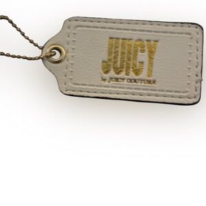 Juicy Couture Cream and Gold bag tag